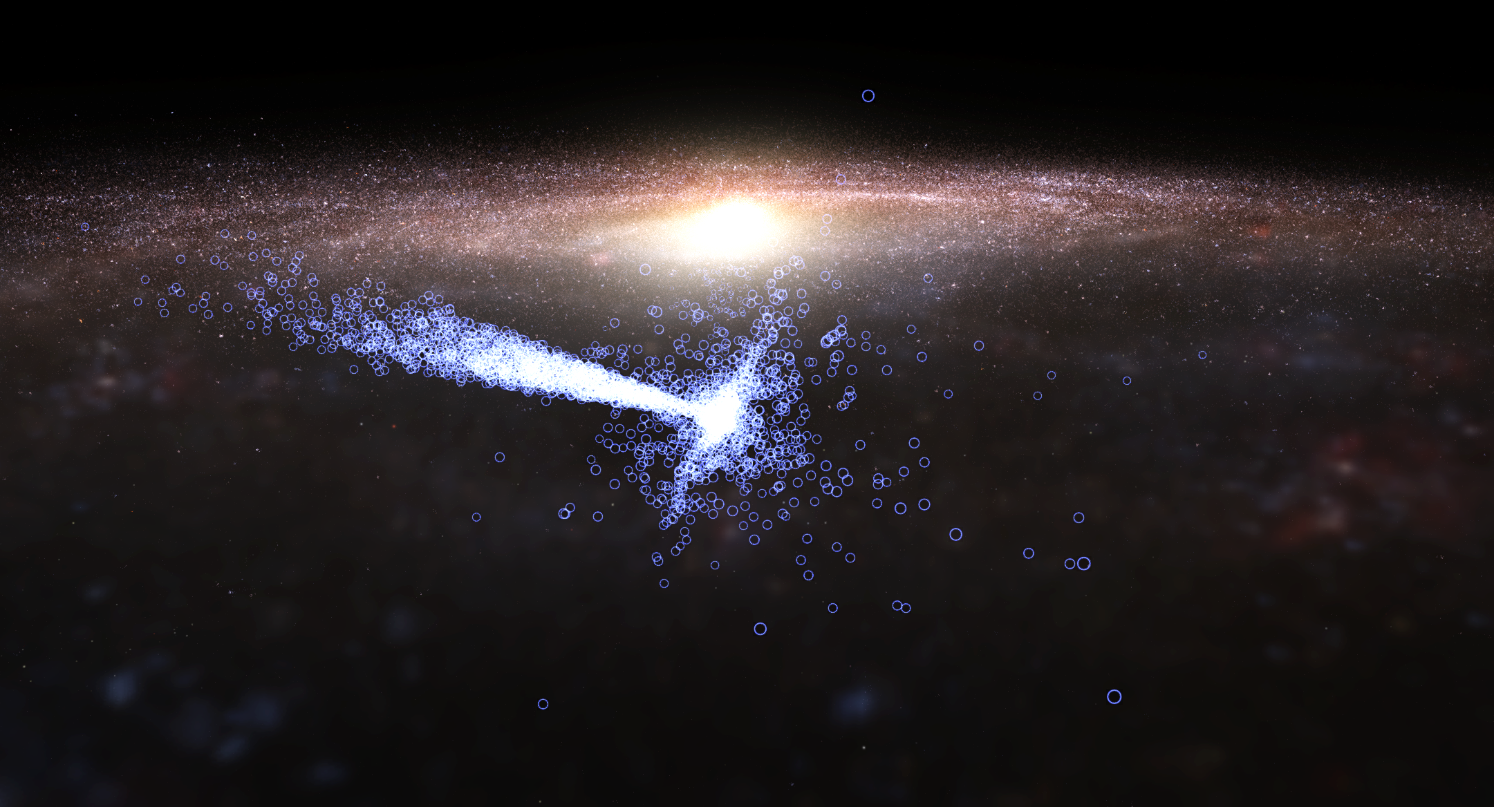 A view of the Milky Way Galaxy with the exoplanet systems shown as blue rings. Most systems are clustered around the SUn, but Kepler's data extends deeper into the Galaxy toward the left in this image.