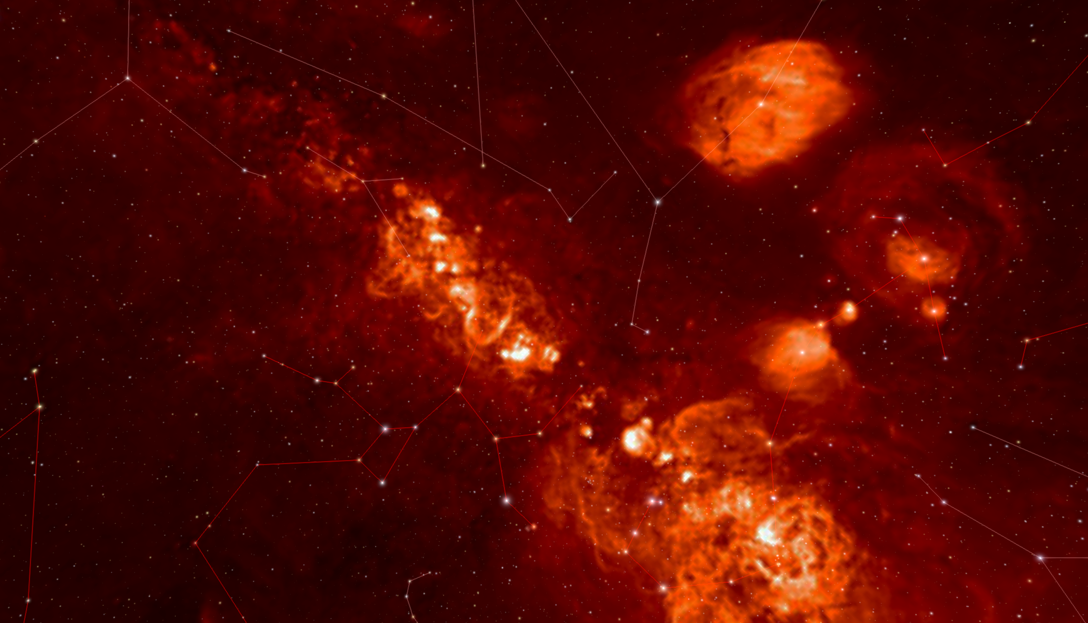 An image of the night sky in hydrogen-alpha light. The light is orange in color and shows where there is glowing hydrogen gas.