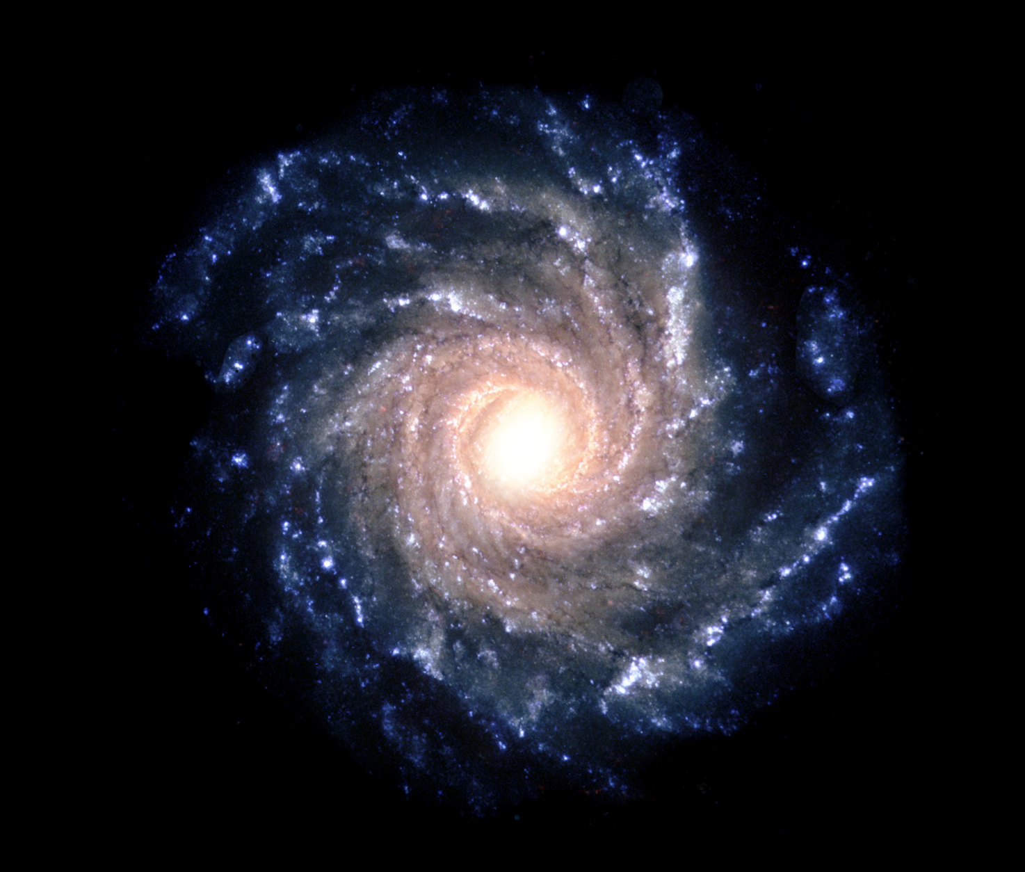 The Milky Way image shown with the Milky Way Volume. We are looking down on the galactic disk, showing the bright core and spiral arms.